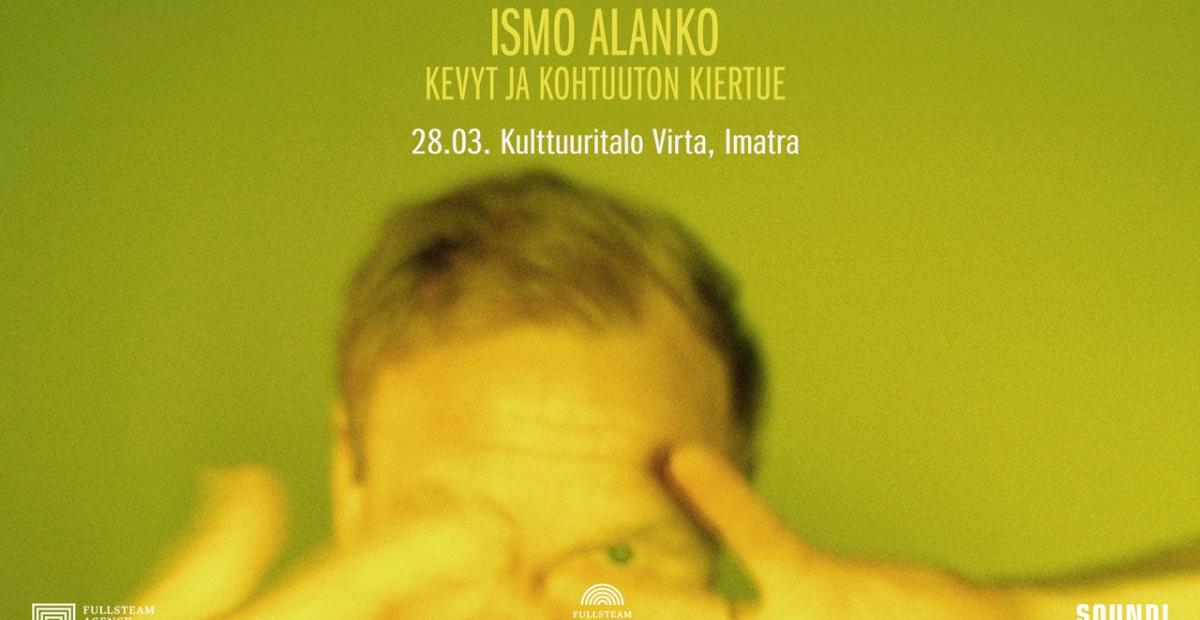 Vihreäkeltainen tausta, jossa näkyy ihmisen pää,hiukset ja kädet sumuisesti